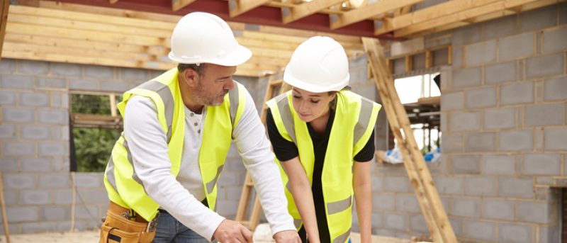 Female carpentry apprentice on site