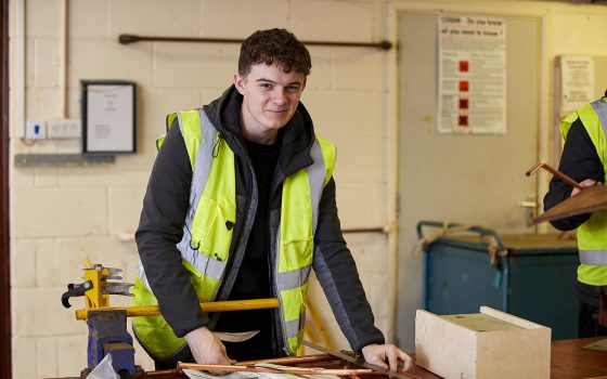 Student measuring pipe