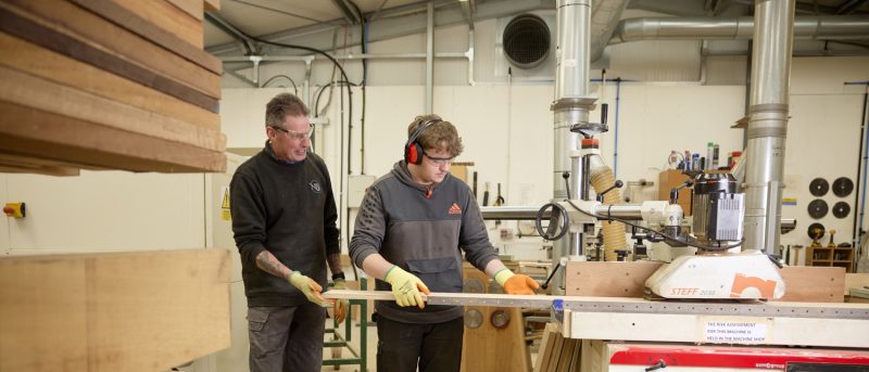 Furniture studies student taking part in work experience at Neil Burke Joinery