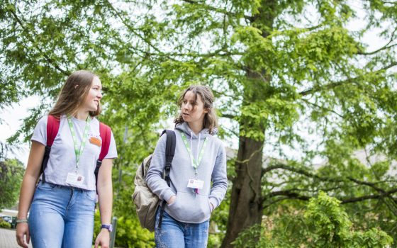 Students walking through arboretum