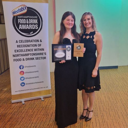 Lecturer Rachel Roy standing with Chloe, winner of the College Student of the Year Award at the Northamptonshire Food and Drink Awards 2024