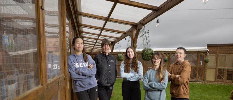 Cloverlea Cattery owner Christine with Moulton College work experience students