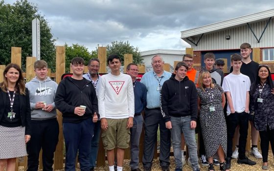 Students and staff celebrating the official unveling of the project