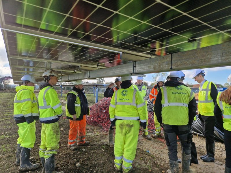 Senior Civil Servants meet with graduates of the Solar Power SWAP at a Solar Farm