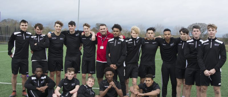 Tim Dudding Head of Football at Moulton College with Academy players