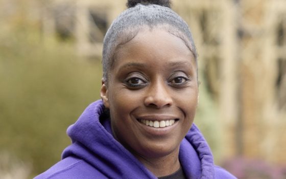 Careers Advisor smiling wearing a purple moulton hoodie